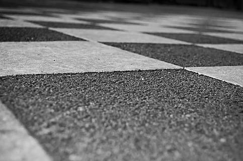 chessboard, pattern, floor, black, white, art, square, squares, architecture, surface, background, no people, selective focus, day, sunlight, asphalt, sport, textured, surface level, road, outdoors, nature, shadow, absence, street, footpath, city, court, sign, geometric shape, concrete, dividing line, 1080P, CC0, public domain, royalty free
