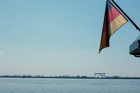 ship, German flag, other, flag, sea, sky, travel Locations, blue, wind, water, no people, patriotism, outdoors, day, copy space, clear sky, nature, waterfront, architecture, built structure, tranquility, environment, national icon, 4K, CC0, public domain, royalty free