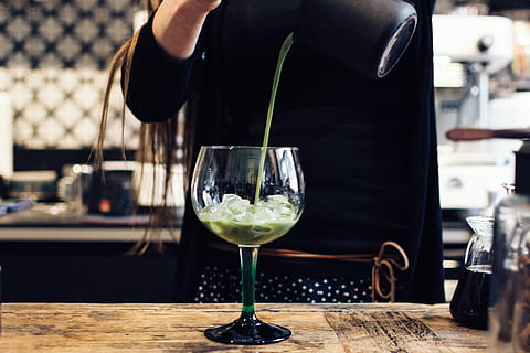 preparing matcha cocktail, Matcha, cocktail, café, drink, hands, process, alcohol, restaurant, drinking Glass, men, table, bar - Drink Establishment, wine, indoors, people, wineglass, bar Counter, food And Drink, refreshment, glass, focus on foreground, one person, pouring, midsection, real people, business, freshness, occupation, bartender, 5K