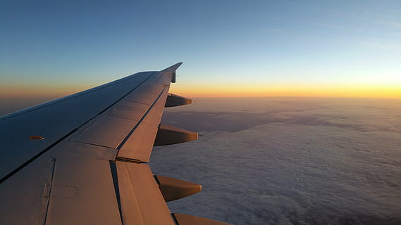 gray airplane wing, plane, sky, cloud, wing, planes, horizon, sunset, airplane, flying, air Vehicle, commercial Airplane, window, travel, aircraft Wing, air, transportation, cloud - Sky, blue, looking Through Window, aerial View, journey, stratosphere, mode of transportation, nature, environment, mid-air, no people, outdoors, motion, aerospace industry, above, 5K, CC0, public domain, royalty free