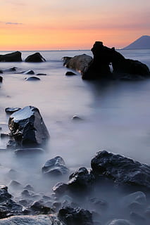 playa, puesta de sol, paisaje, naturaleza, mar, roca - objeto, scenics, oscuridad, agua, al aire libre, línea costera, paisajes - naturaleza, belleza en la naturaleza, cielo, rock, sólido, escena tranquila, tranquilidad, nadie, larga exposición, frente al mar, nube - cielo, idílico, color naranja, horizonte sobre el agua, iceberg, 5K, CC0, dominio público, libre de derechos