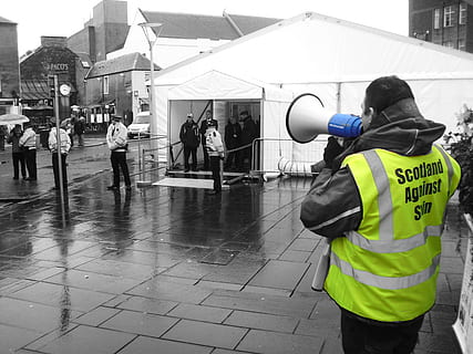 protest, protesters, demonstration, policeman, scotland, real people, protection, clothing, group of people, security, safety, street, reflective clothing, men, city, occupation, people, day, standing, wet, protective workwear, architecture, communication, crowd, outdoors, rain, uniform, government, 2K, CC0, public domain, royalty free