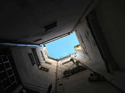 building, perspective, sky, windows, public domain images, architecture, built structure, building exterior, no people, day, nature, low angle view, outdoors, window, residential district, construction site, wall - building feature, mode of transportation, city, transportation, white color, directly below, ceiling, 2K, CC0, public domain, royalty free