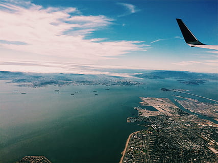 aerial, photography, city, body, water, photo, day, time, airplane, view, flying, flight, transportation, coast, ocean, sea, blue, sky, clouds, boats, aerial view, journey, cityscape, no people, aircraft wing, air vehicle, cloud - sky, mode of transportation, mid-air, beauty in nature, scenics - nature, travel, nature, architecture, outdoors, 1080P