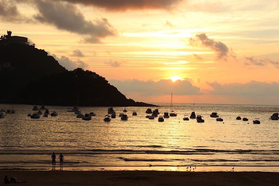 posta de sol, donostia, shell, mar, platja, naturalesa, aigua, vespre, estiu, línia de costa, cel, sol, llum solar, escena tranquil·la, paisatge, escenics, vacances, a l'aire lliure, núvol - cel, llocs de viatges, reflexió, silueta, escenics - natura, bellesa a la natura, tranquil·litat, color taronja, terra, idíl·lic, horitzó sobre l’aigua, cap gent, horitzó, 5K