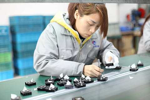 woman, creating, electronic, devices, workshop, operator, the assembly line, one person, occupation, indoors, looking down, focus on foreground, front view, healthcare and medicine, expertise, brown hair, looking, women, skill, females, holding, working, clothing, technology, real people, lab coat, 5K, CC0, public domain, royalty free