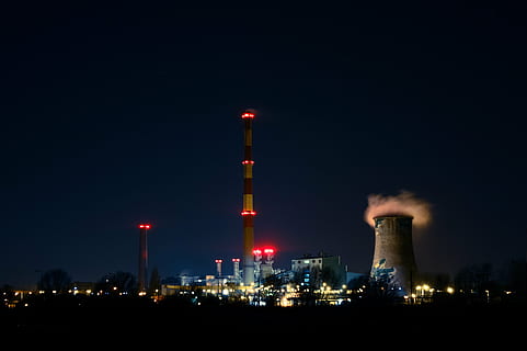 building, construction, factory, industry, night, pollution, production, tower, building exterior, architecture, smoke stack, built structure, illuminated, sky, smoke - physical structure, environmental issues, no people, fuel and power generation, power station, nature, air pollution, environment, city, outdoors, fumes, cooling tower, chemical plant, 5K, CC0, public domain, royalty free
