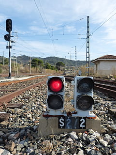 pathways, traffic light, train, railway, station, technology, rail transportation, cable, railroad track, track, electricity, sky, nature, day, power line, transportation, no people, electricity pylon, power supply, cloud - sky, connection, outdoors, public transportation, rock, solid, gravel, 4K, CC0, public domain, royalty free