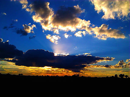 sun, behind, clouds, cloud, sun from behind, sunrays, blue sky, weather, cloud - sky, sky, sunset, beauty in nature, silhouette, tranquility, nature, scenics - nature, dramatic sky, no people, tranquil scene, environment, outdoors, orange color, landscape, idyllic, sunlight, cloudscape, dusk, 2K, CC0, public domain, royalty free