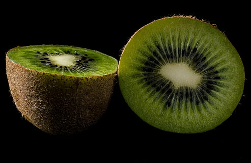 Kiwi, close up, fruit, green, food, freshness, slice, kiwi - Fruit, cross Section, ripe, healthy Eating, close-up, organic, food And Drink, vegetarian Food, green Color, nature, no People, black background, studio shot, wellbeing, indoors, two objects, still life, halved, cut out, 2K