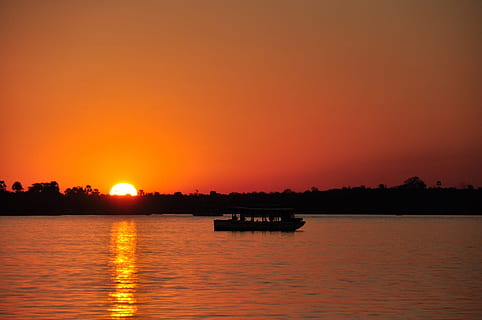 posta de sol, riu, sol, arrencada, zambezi, romanç, aigua, abendstimmung, vespre, naturalesa, mar, cel, reflexió, color taronja, estiu, llum solar, a l'aire lliure, paisatge, llac, silueta, escenics, escena tranquil·la, vaixell nàutic, transport, escenics - natura, bellesa a la natura, davant del mar, tranquil·litat, cap gent, manera de transport, 1080P, CC0, domini públic, lliure de regalies