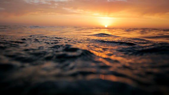 body, water, sunset, ocean, surface, waves, sea, pattern, ripple, motion, macro, evening, scene, peaceful, nature, beauty in nature, scenics, tranquility, tranquil scene, no people, sky, outdoors, scenics - nature, cloud - sky, dramatic sky, environment, land, orange color, horizon, sun, urban skyline, landscape, wave, dusk, horizon over water, abstract, 2K, CC0, public domain, royalty free