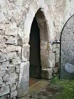 door, entry, stone, opening, grid, input, old, metal, religion, church, christianity, faith, architecture, monument, built structure, arch, wall - building feature, no people, the past, history, wall, day, building, building exterior, stone wall, entrance, weathered, brick wall, brick, nature, outdoors, solid, ancient civilization, 1080P, CC0, public domain, royalty free