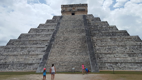 chichen itza, cancun, aztecs, architecture, built structure, sky, history, the past, cloud - sky, ancient, tourism, men, travel destinations, women, real people, building exterior, travel, adult, day, ancient civilization, nature, group of people, archaeology, outdoors, 5K, CC0, public domain, royalty free