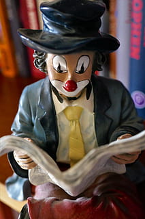 figure, clown, read, funny, decoration, colorful, sitting, newspaper, make up, hat, cylinder, tie, books, news, curious, interest, world events, clown nose, sit, print media, human representation, indoors, representation, front view, one person, close-up, art and craft, clothing, disguise, holding, female likeness, paint, sculpture, make-up, mask, mask - disguise, creativity, witch, obscured face, 5K, CC0, public domain, royalty free