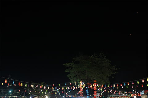 assorted-color string lights, photo, multicolored, hanging, decor, string lights, lanterns, dark, night, sky, large group of people, crowd, people, lifestyles, illuminated, leisure activity, real people, men, travel destinations, tree, copy space, group of people, plant, architecture, nature, celebration, lighting equipment, city, outdoors, adult, light, 1080P, CC0, public domain, royalty free