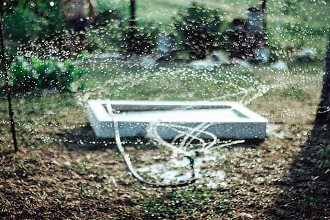 untitled, shallow, focus, photography, sprinkler, water, grass, dirt, backyard, abandoned, day, no people, outdoors, seat, bench, wet, nature, plant, park, drop, rain, empty, absence, land, transportation, mode of transportation, snowing, park bench, rainy season, raindrop, 5K, CC0, public domain, royalty free