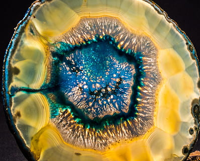 yellow geode, agate slice, blue, close, light, close-up, healthcare and medicine, science, no people, indoors, anatomy, biology, extreme close-up, black background, food and drink, cross section, shape, microbiology, studio shot, magnification, technology, yellow, macro, 2K, CC0, public domain, royalty free