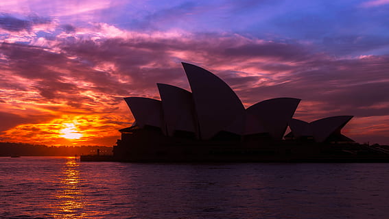 silhouette, sydney opera house, australia, west, słonca, water, sunset, sky, architecture, no people, city, sea, nature, cloud - sky, travel destinations, building exterior, reflection, dusk, dramatic sky, outdoors, arts culture and entertainment, purple, 5K, CC0, public domain, royalty free
