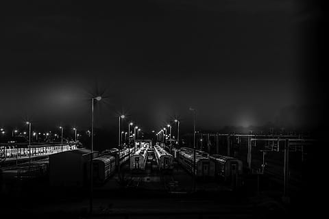 black-and-white, dark, lights, train station, trains, transportation system, black And White, industry, factory, pollution, night, illuminated, transportation, mode of transportation, street light, no people, sky, architecture, nature, built structure, building exterior, street, lighting equipment, outdoors, city, train, rail transportation, travel, train - vehicle, shunting yard, 5K, CC0, public domain, royalty free