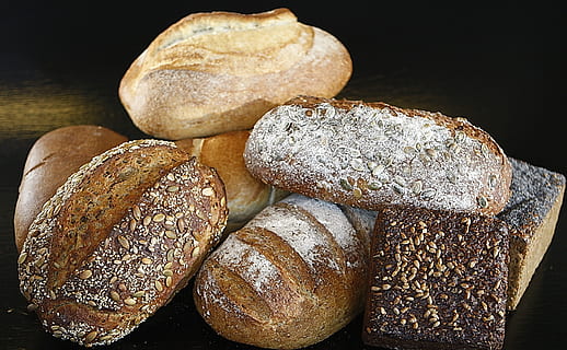 bread, food, healthy, dark, bake, baking, breakfast, cereal, close-up, delicious, dough, flour, fresh, freshly baked, grainy bread, health, loaf, nutrition, rye, seed, sesame, sliced, wheat, whole, food and drink, freshness, baked, loaf of bread, healthy eating, wellbeing, indoors, black background, store, bakery, still life, studio shot, no people, brown, choice, table, wholegrain, brown bread, french food, 2K, CC0, public domain, royalty free