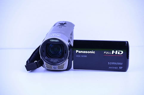 camera, panasonic, video-, doelstelling, besnoeiing, microfoon, technologie, fotografie thema's, tekst, film industrie, geen mensen, detailopname, binnenshuis, camera - fotografische apparatuur, studio opname, stilleven, communicatie, westers schrift, fotografische apparatuur, enkel object, kopie ruimte, lens - optisch instrument, retro gestileerd, kunst cultuur en entertainment, camera film, thuis videocamera, digitale camera, persoonlijk accessoire, 4K, CC0, publiek domein, royaltyvrij