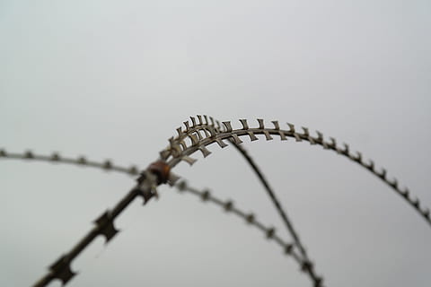 Nato, Barbed Wire, Sharp, nato wire, razor razor sharp, protection, obstacle, metal, s wire, z wiring, razor wire, military range, military zone, no people, arts culture and entertainment, day, outdoors, close-up, sky, fence, boundary, safety, barrier, wire, security, amusement park, selective focus, wire mesh, amusement park ride, architecture, viewpoint, gray, nature, alloy, steel, 5K, CC0, public domain, royalty free