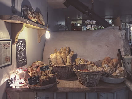brown, wicker baskets, vegetables, bread, bakery, baking, baskets, loafs, food, food and drink, container, freshness, basket, choice, illuminated, variation, indoors, wicker, lighting equipment, for sale, no people, large group of objects, still life, table, healthy eating, store, retail, french food, 1080P, CC0, public domain, royalty free