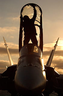 sky, clouds, sun, sailor, plane, aircraft, fighter jet, canopy, cockpit, cleaning, preparing, navy, military, ship, carrier, outside, silhouette, beautiful, sunset, sunrise, no people, cloud - sky, nature, air vehicle, transportation, airplane, mode of transportation, outdoors, close-up, low angle view, human representation, weapon, representation, art and craft, travel, orange color, aerospace industry, 1080P, CC0, public domain, royalty free