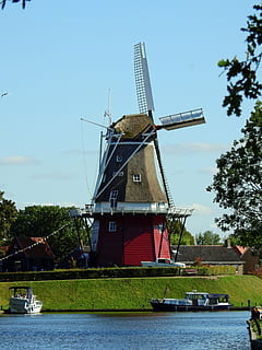 mølle, vindmølle, bygning, himmel, vinge, vind, Friesland, holland, historisk, vand, kanal, Nordsøen, vindkraft, alternativ energi, turbine, vedvarende energi, traditionel vindmølle, træ, plante, miljøbeskyttelse, natur, bygget struktur, havnefronten, arkitektur, miljø, dag, brændstof og elproduktion, flod, udendørs, ingen mennesker, 4K, CC0, offentligt domæne, royaltyfrie