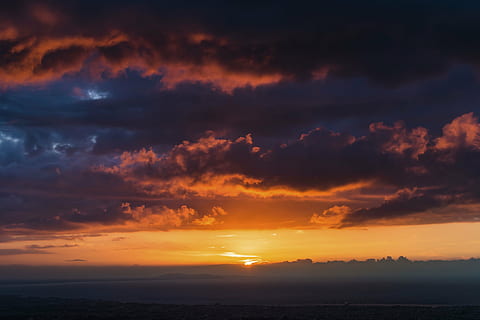 gold hour photography, sky, sunset, view, peak, dark, clouds, nature, dramatic sky, scenics, cloud - sky, tranquility, tranquil scene, beauty in nature, sun, scenics - nature, orange color, idyllic, no people, environment, sea, landscape, cloudscape, horizon, water, outdoors, romantic sky, 5K, CC0, public domain, royalty free