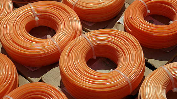 cable, orange, work, grasstrimmers, garden, neon colors, role, full frame, backgrounds, no people, large group of objects, close-up, spiral, pattern, abundance, orange color, indoors, shape, stack, geometric shape, red, food, rolled up, industry, still life, multi colored, 5K, CC0, public domain, royalty free