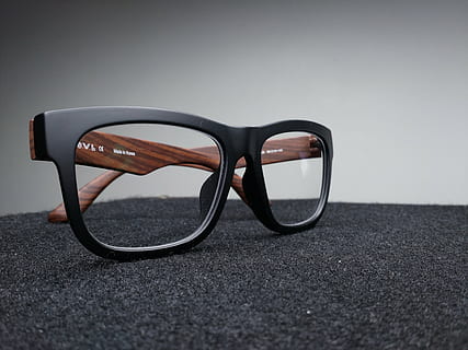 black framed eyeglasses, black, brown, framed, wayfarer, style, eyeglasses, textile, objects, sunglasses, eyewear, eyesight, fashion, single object, protection, no people, reading glasses, gray background, glasses, close-up, indoors, still life, personal accessory, black color, security, surface level, table, vignette, safety, focus on foreground, 3-d glasses, 4K, CC0, public domain, royalty free
