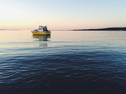 yellow, white, boat, calm, water, daytime, yacht, body, ship, ocean, sea, coast, horizon, sunset, dusk, sky, landscape, reflection, nautical vessel, nature, outdoors, transportation, no people, tranquility, mode of transportation, beauty in nature, scenics - nature, tranquil scene, sunlight, clear sky, waterfront, anchored, 2K