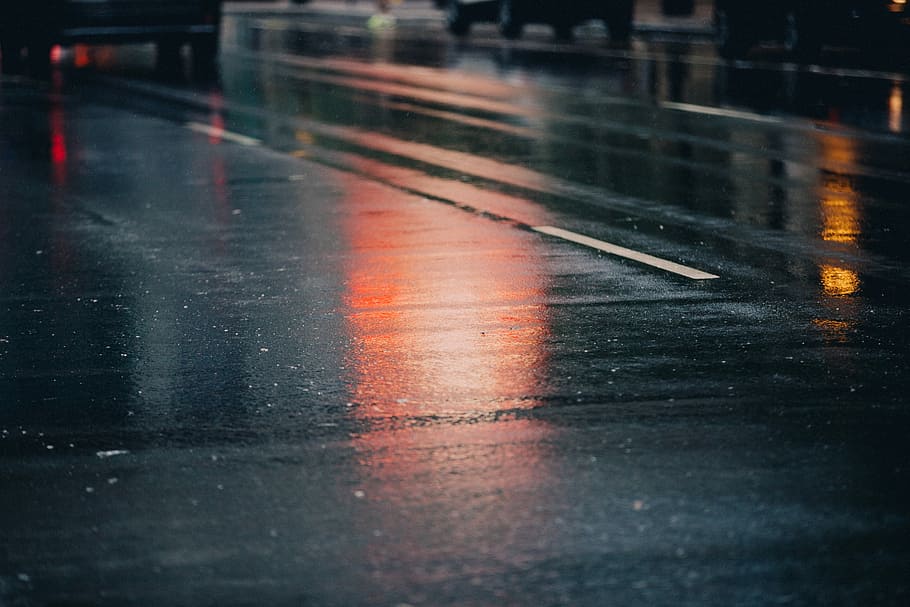 gray concrete pavement, street, wet, rain, reflection, road, transportation, city, mode of transportation, water, no people, rainy season, road marking, marking, motor vehicle, drop, glass - material, car, sign, raindrop, outdoors, surface level, 5K