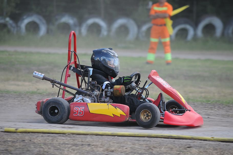 Formel, ein, Argentinien, Transport, Transportmittel, Landfahrzeug, Sportrennen, Wettbewerb, Fokus auf den Vordergrund, Tag, Motorrad, Kopfbedeckungen, echte Menschen, Sport, Helm, rot, Menschen, draußen, Fahren, Motorsport, Sturzhelm, Schutz, Autorennbahn, 4K
