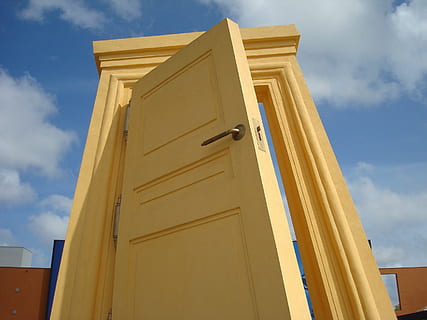 yellow, wooden, door, cloudy, sky, daytime, input, output, input range, gate, plopsaland, belgium, low angle view, architecture, building exterior, cloud - sky, built structure, sunlight, day, no people, outdoors, building, nature, city, house, pattern, communication, wood - material, residential district, blue, 2K, CC0, public domain, royalty free