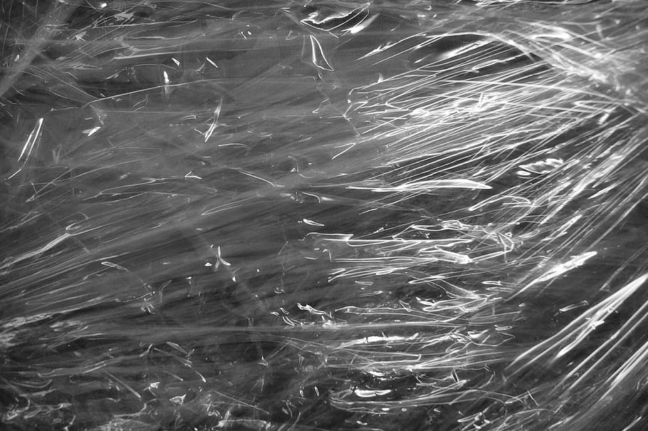 paquet de plàstic transparent, lliscar, embalat, transparent, estructura, plàstic, fons, enviar, textura, captació, extracte, moure, paquet, embolcall, resum, marc complet, cap gent, patró, naturalesa, nit, primer pla, moviment, a l'aire lliure, aigua, il·luminat, vista d’angle alt, davant del mar, nedar, moviment borrós, bellesa a la natura, escola de peixos, 4K