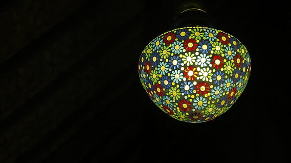 chandelier, dent, west java, lamp, antique, flowers, illuminated, lighting equipment, decoration, no people, indoors, black background, pattern, electric lamp, close-up, low angle view, hanging, sphere, studio shot, multi colored, electricity, dark, floral pattern, pendant light, cut out, copy space, ornate, light, ceiling, 2K, CC0, public domain, royalty free