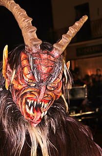 mask, panel, facemask, carnival, devil, real people, focus on foreground, indoors, arts culture and entertainment, people, costume, close-up, rear view, lifestyles, unrecognizable person, performance, leisure activity, incidental people, hair, clothing, headwear, headshot, hairstyle, headdress, stage, human hair, 4K, CC0, public domain, royalty free