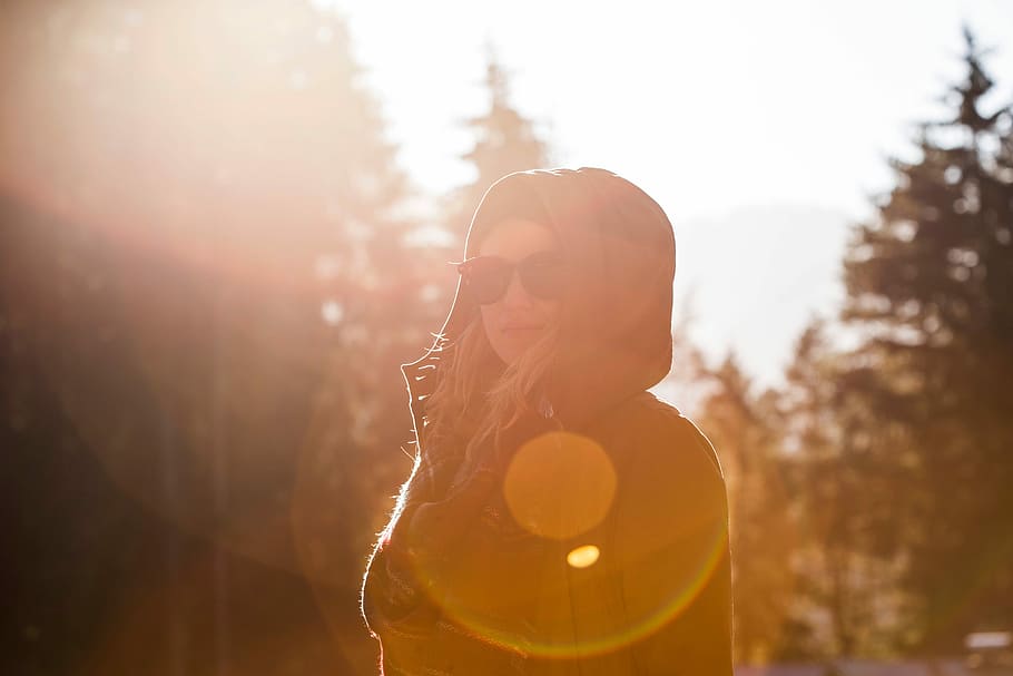 woman, wearing, brown, hoodie, sunshine, outdoors, men, music, one Person, lifestyles, people, adult, young Adult, sport, sunlight, lens Flare, recreational Pursuit, caucasian Ethnicity, headphones, copy Space, nature, leisure Activity, males, enjoyment, healthy Lifestyle, smiling, one Man Only, adults Only, portrait, glasses, women, young women, tree, happiness, emotion, headshot, sunglasses, fashion, hairstyle, beautiful woman, 5K
