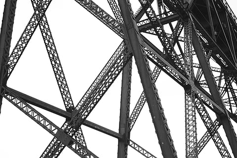 low-angle photo, gray, metal structure, structure, beams, engineering, mechanical, railroad, bridge, construction, architecture, building, frame, design, metal, steel, industrial, industry, house, development, site, iron, framework, modern, new, build, wall, home, project, girder, business, urban, work, sky, interior, white, strength, concrete, estate, 3d, structural, low angle view, connection, built structure, no people, day, bridge - man made structure, nature, outdoors, clear sky, grid, tall - high, travel destinations, city, tower, alloy, 5K, CC0, public domain, royalty free