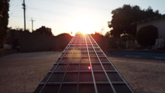 brown, wooden, guitar, fret, board, future, pathway, optimism, music, instrument, musician, song, entertainment, string, frame, tune, play, wireframe, sunset, sky, nature, outdoors, sunlight, sun, lens flare, architecture, dusk, plant, travel, transportation, city, tree, people, vanishing point, environment, landscape, freedom, 2K, CC0, public domain, royalty free