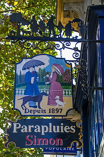 shield, craftsmen, note, facade, france, paris, text, built structure, tree, architecture, building exterior, communication, sign, western script, day, plant, low angle view, building, nature, outdoors, information, human representation, city, information sign, capital letter, representation, 4K, CC0, public domain, royalty free