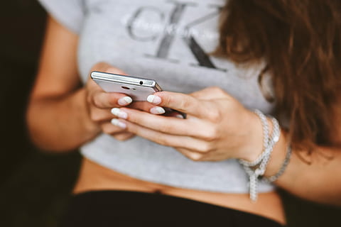 young, woman, holding, white, mobile, phone, caucasian, female, girl, tech, technology, hands, femine, white phone, smartphone, screentouch, women, adult, females, people, mobile Phone, young Adult, young Women, part Of, adults Only, lifestyles, caucasian Ethnicity, indoors, text Messaging, only women, midsection, communication, casual clothing, one person, wireless technology, connection, close-up, jewelry, smart phone, human body part, hand, hairstyle, 5K
