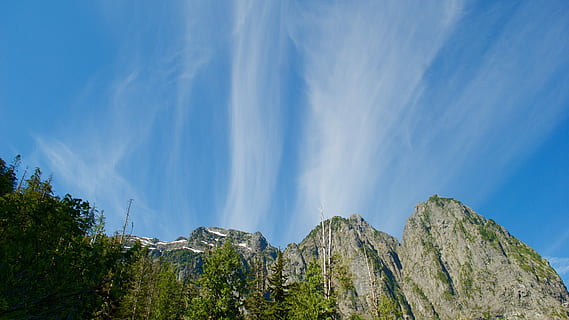 sky, mountains, blue, rocks, climb, hard, tough, beauty in nature, scenics - nature, tree, cloud - sky, plant, mountain, nature, tranquil scene, tranquility, rock, non-urban scene, environment, mountain range, no people, rock - object, idyllic, landscape, low angle view, outdoors, mountain peak, formation, 4K, CC0, public domain, royalty free