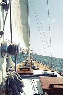 brown, white, sailing boat, body, water, person, talking, photo, sailboat, sea, sailing, deck, bow, rope, ocean, waves, sunshine, nautical vessel, yacht, sailing ship, mast, yachting, rigging, transportation, mode of transportation, travel, nature, sky, ship, no people, day, luxury, boat deck, outdoors, wheel, passenger craft, 1080P, CC0, public domain, royalty free
