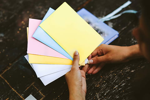 diary, table, Woman reading, woman, book, notebook, hands, reading, memories, journal, memoirs, human Hand, education, learning, people, holding, one Person, human body part, yellow, multi colored, hand, real people, body part, paper, human finger, finger, close-up, unrecognizable person, high angle view, leisure activity, personal perspective, lifestyles, focus on foreground, human limb, 5K