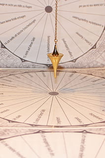 pendulum, pointing, wheel, pendulum boards, board, template, vibrations, vibration, pendulum vibrations, commute, lot, cone, conical, tools, frequency, new age, spiritual, symbol, pendulum frequency, indoors, no people, close-up, paper, text, design, shape, still life, education, map, geometric shape, communication, selective focus, pattern, number, publication, book, gold colored, accuracy, full frame, 1080P, CC0, public domain, royalty free