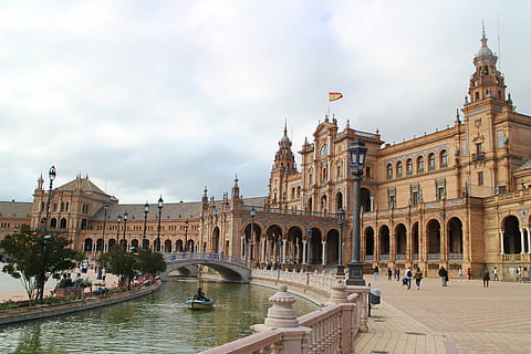 spain, architecture, square, built structure, building exterior, travel destinations, incidental people, sky, water, tourism, travel, city, the past, cloud - sky, history, nature, group of people, building, day, large group of people, arch, outdoors, canal, government, 2K, CC0, public domain, royalty free
